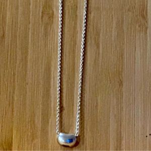 Elsa Peretti Bean design pendant. 9mm, Tiffany and co.